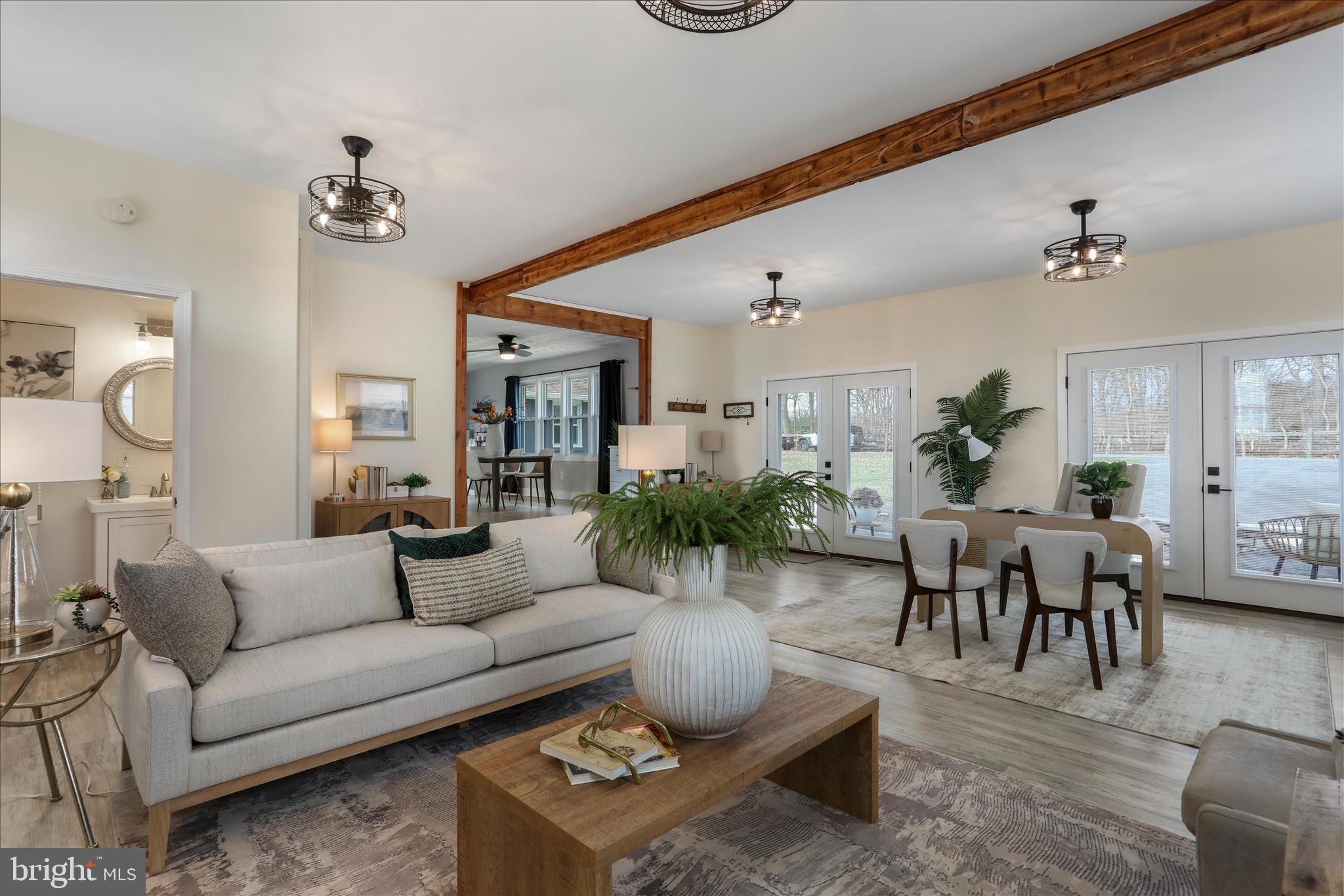 83 Dove Hill Drive Ranson, WV 25438 - Photo 22 of 71 a living room with furniture and a chandelier