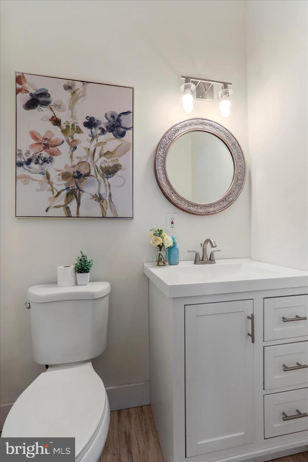 83 Dove Hill Drive Ranson, WV 25438 - Photo 23 of 71 a bathroom with a toilet a sink and mirror