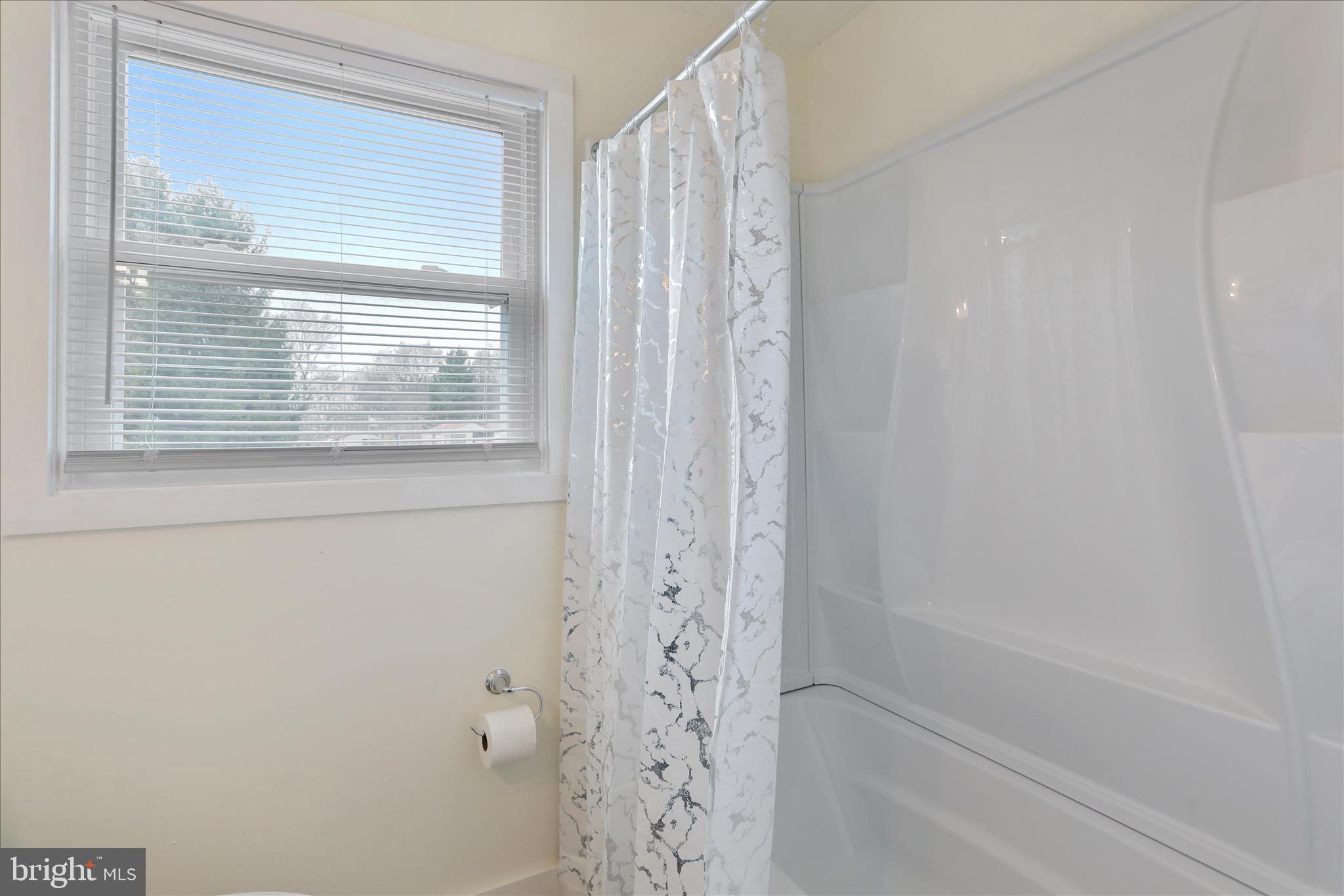 83 Dove Hill Drive Ranson, WV 25438 - Photo 35 of 71 a bathroom with a bathtub and shower