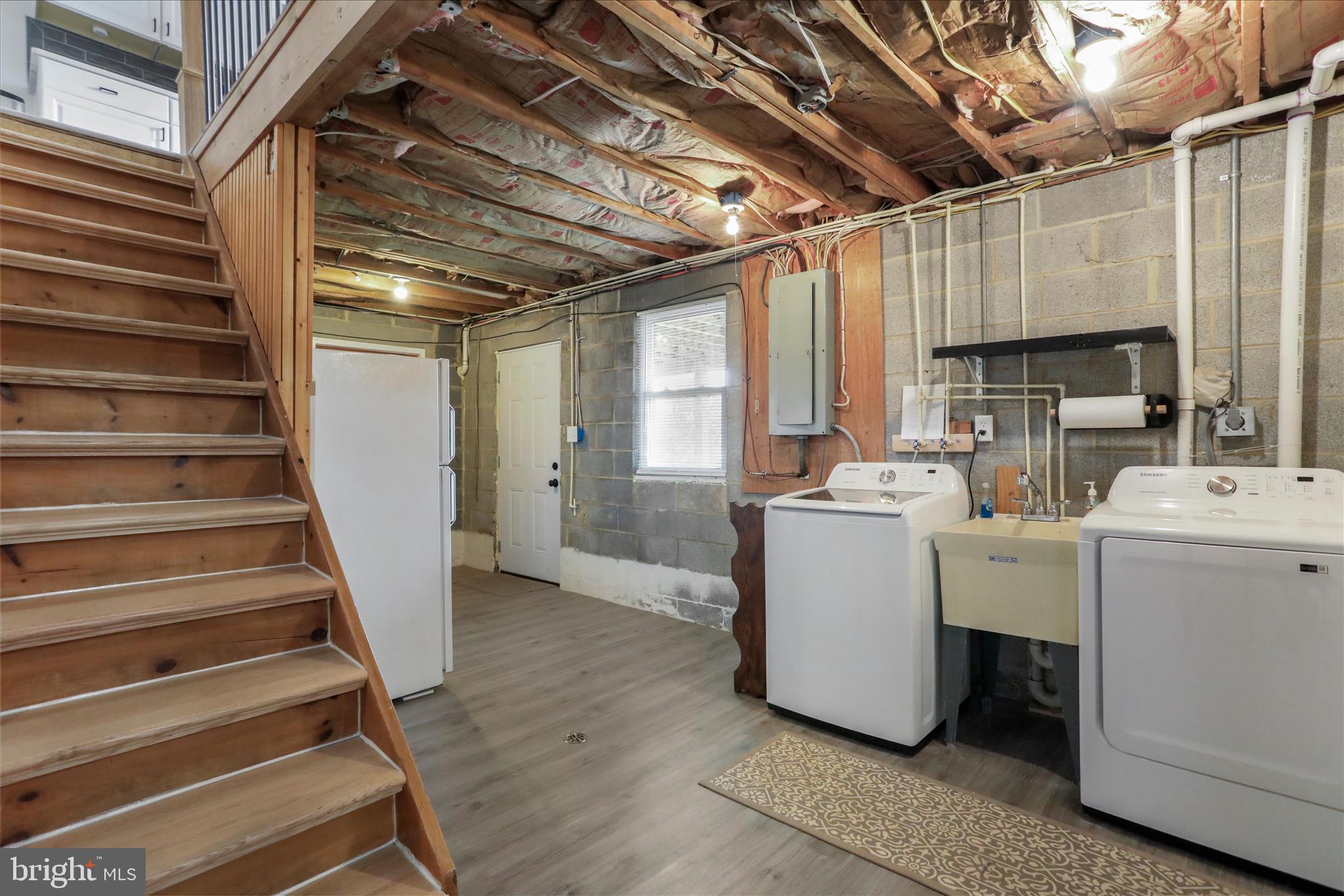 83 Dove Hill Drive Ranson, WV 25438 - Photo 36 of 71 a view of entryway with utility room and washer