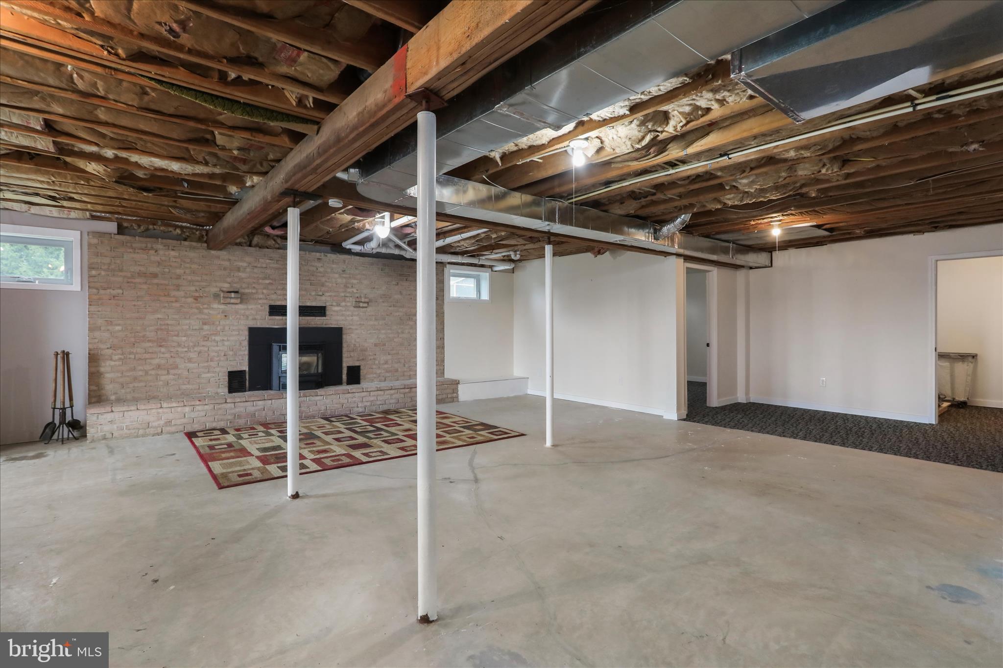 83 Dove Hill Drive Ranson, WV 25438 - Photo 39 of 71 Pellet stove is 1 yr old to heat this huge room