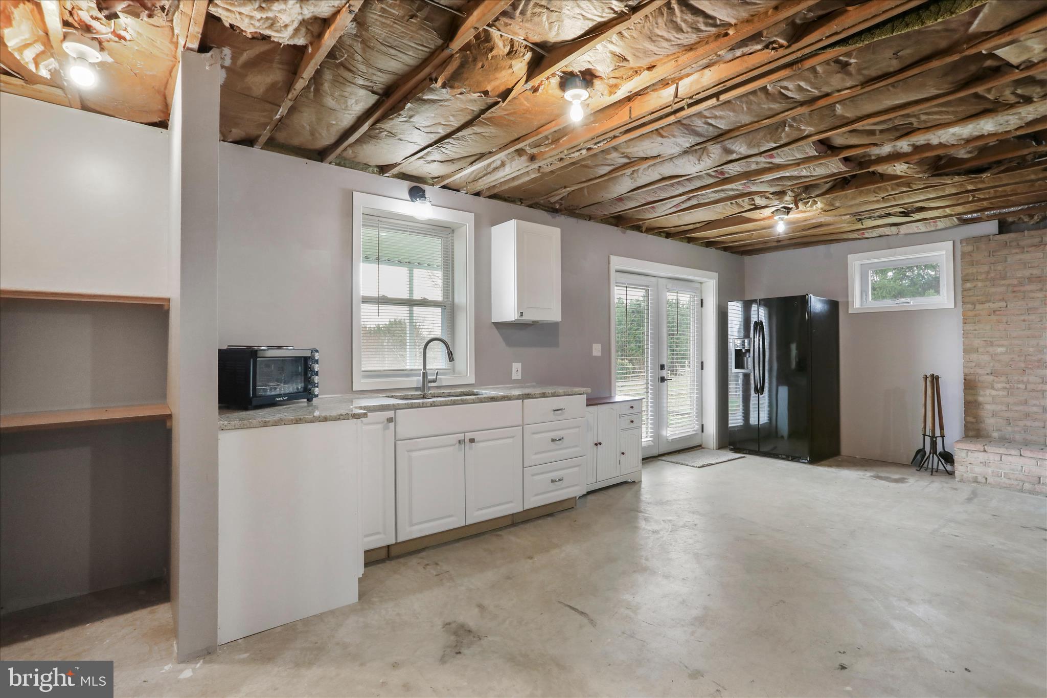 83 Dove Hill Drive Ranson, WV 25438 - Photo 41 of 71 Kitchenette leads to covered patio