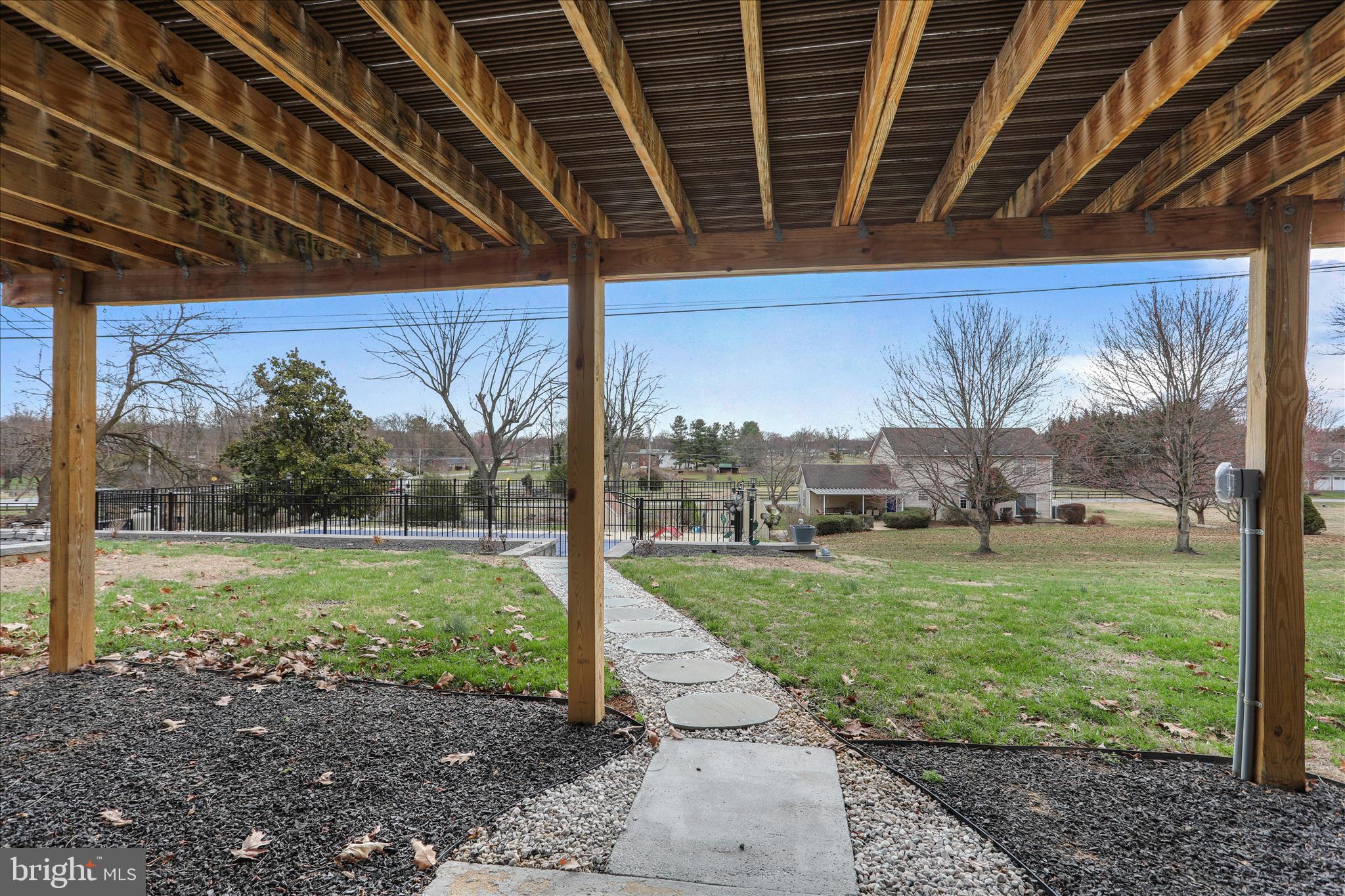 83 Dove Hill Drive Ranson, WV 25438 - Photo 50 of 71 a view of a porch in front of a house with a backyard
