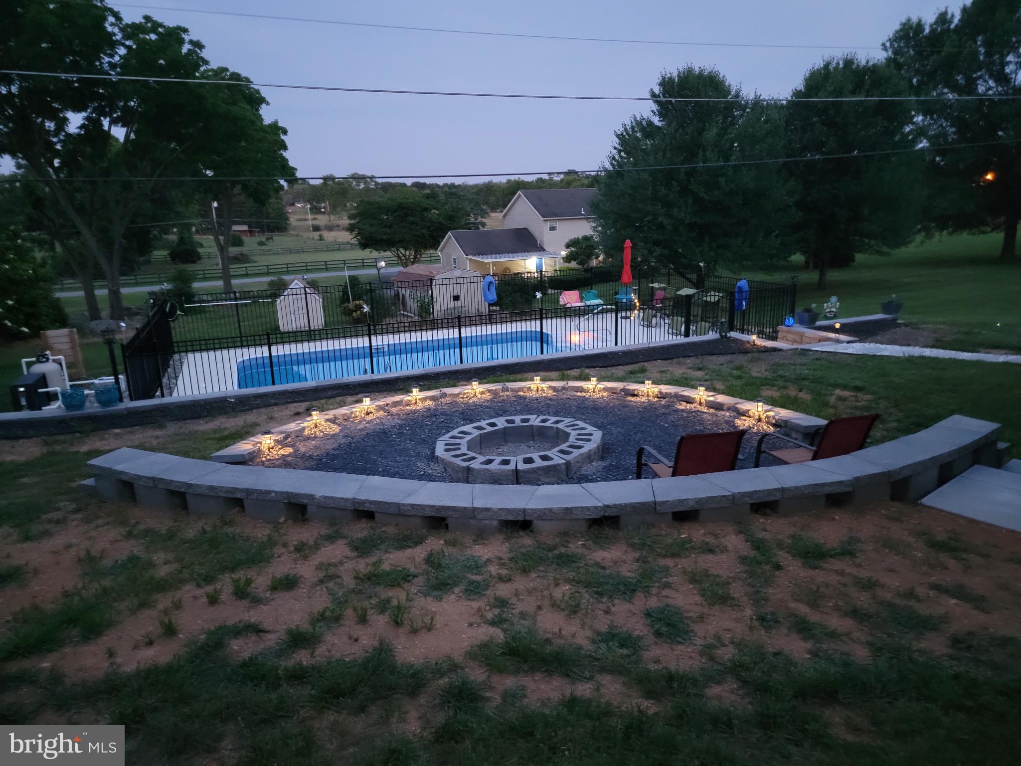 83 Dove Hill Drive Ranson, WV 25438 - Photo 54 of 71 a view of a swimming pool with a yard