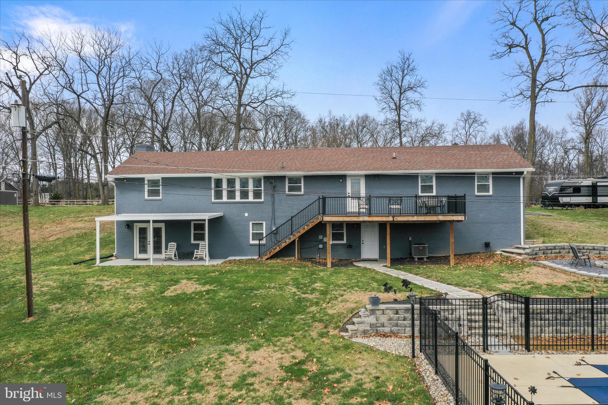 83 Dove Hill Drive Ranson, WV 25438 - Photo 7 of 71 a view of a house with pool and chairs