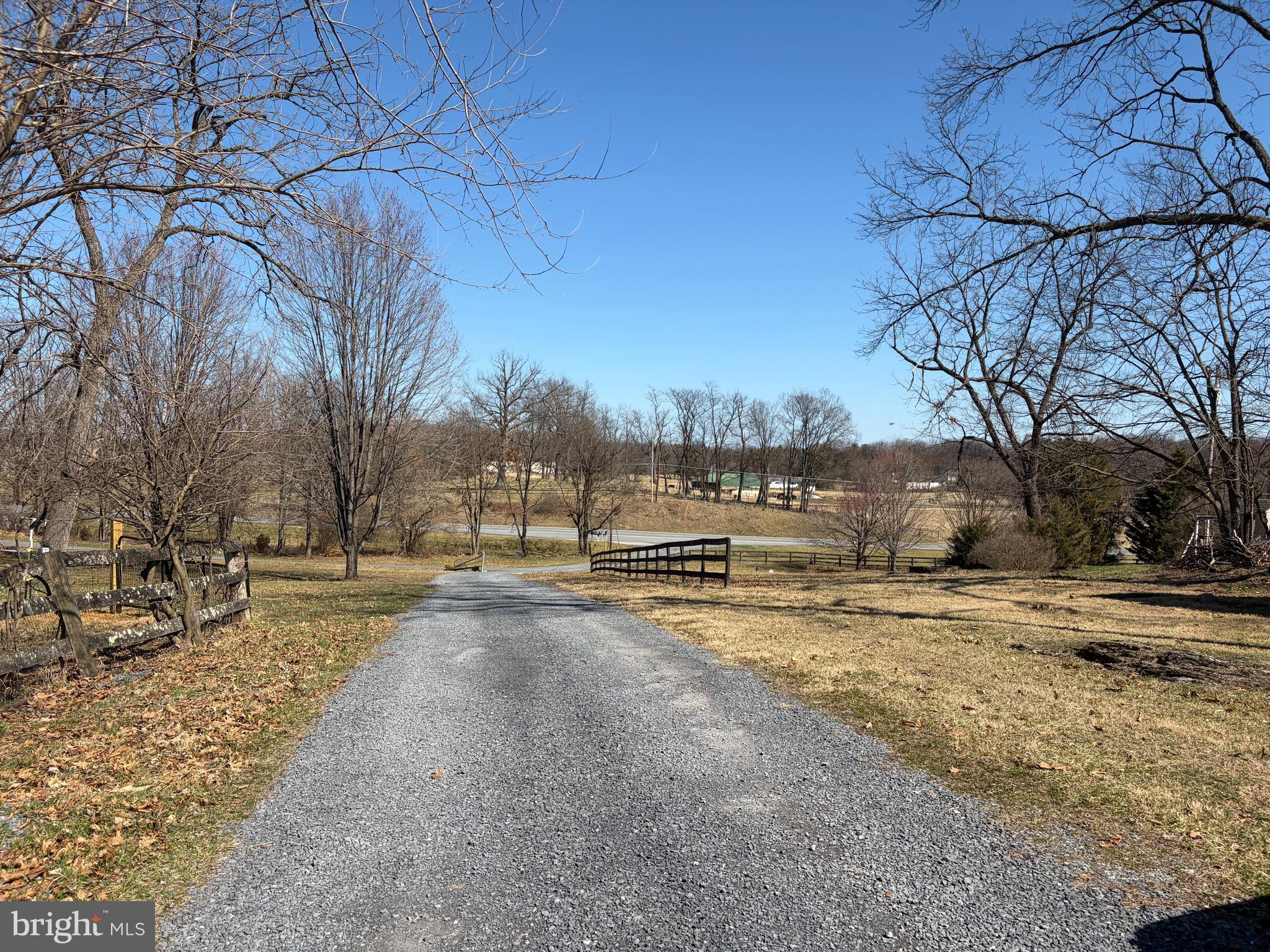 83 Dove Hill Drive Ranson, WV 25438 - Photo 71 of 71 a view of a yard with snow on the road