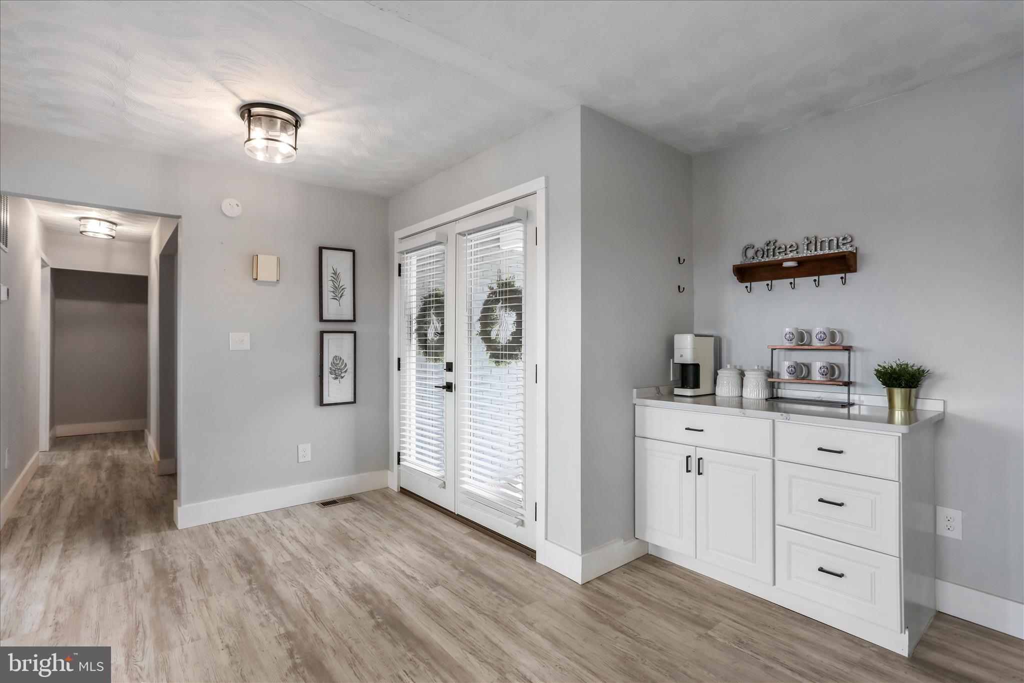 83 Dove Hill Drive Ranson, WV 25438 - Photo 10 of 71 a view of a livingroom with wooden floor