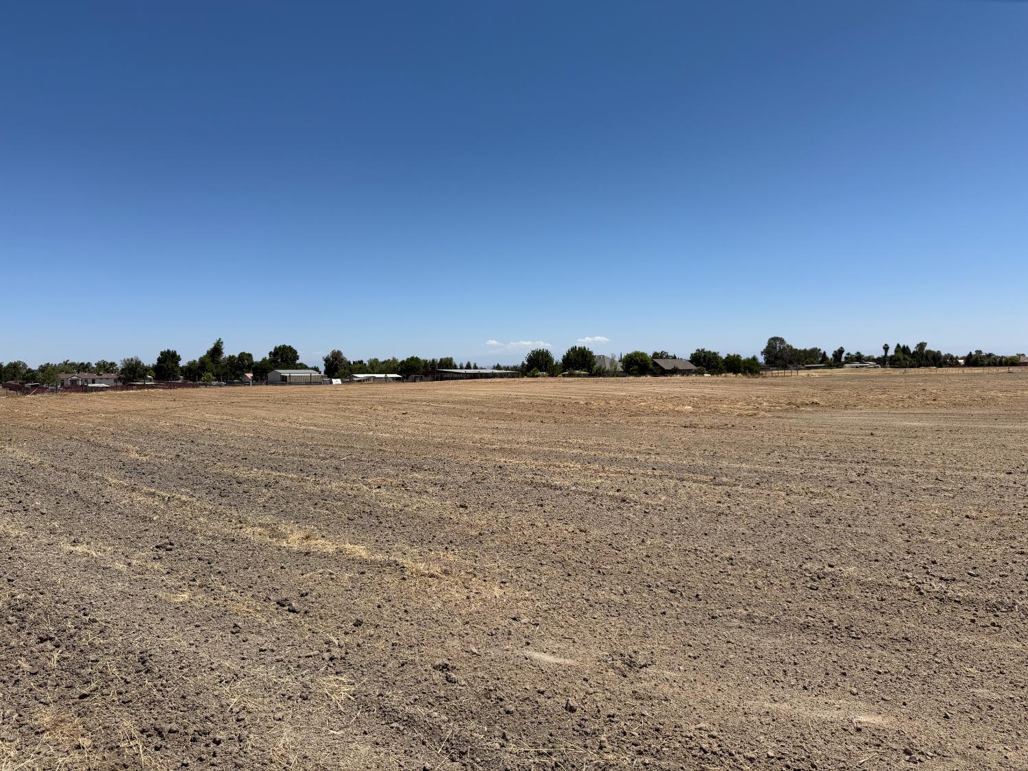 1 Steward Road Madera, CA 93638 - Photo 16 of 29 a view of a lake and sunset
