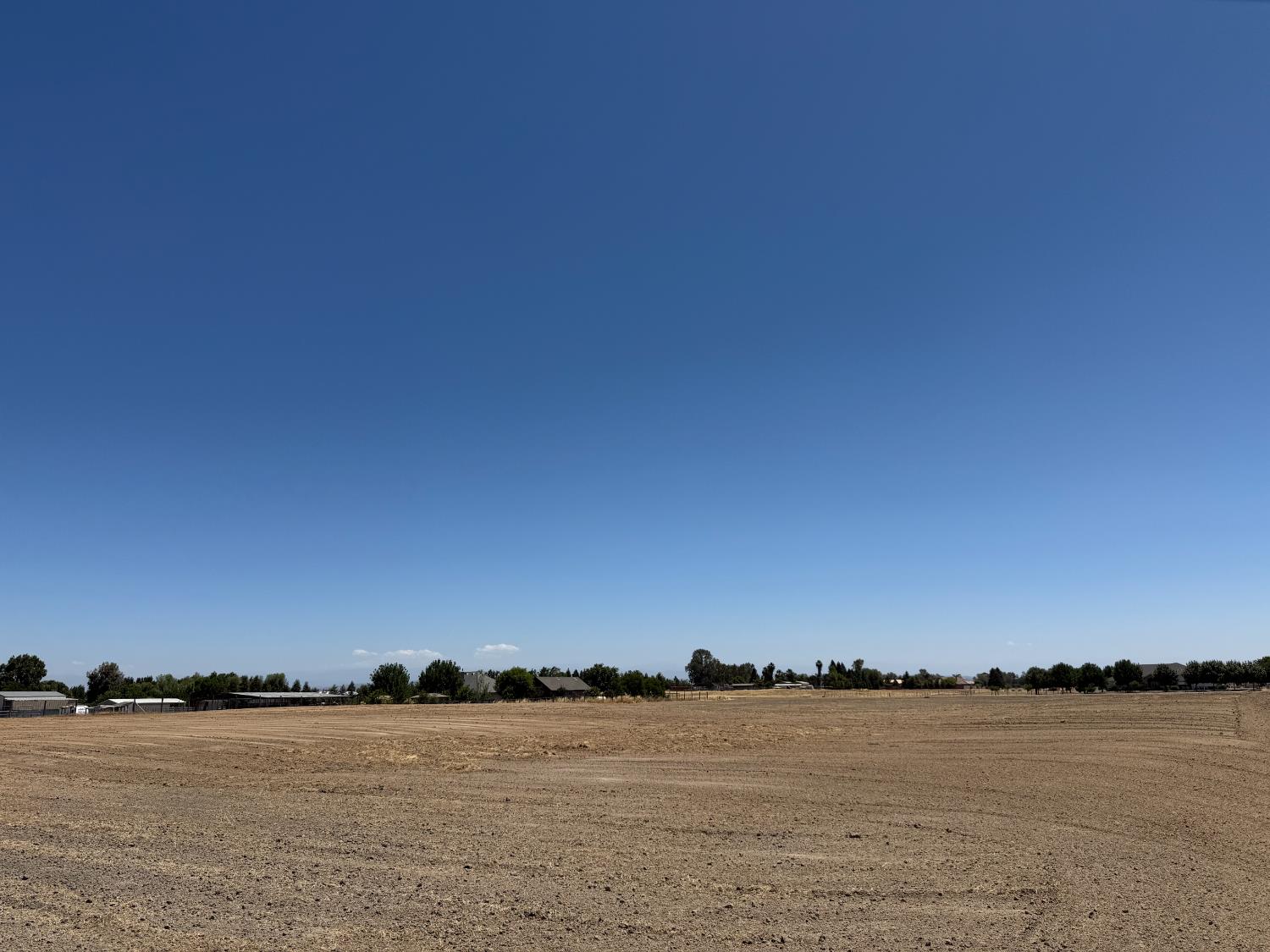 1 Steward Road Madera, CA 93638 - Photo 19 of 29 a view of a lake and sunset