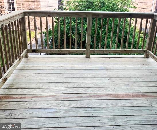 543 North Simpson Street Philadelphia, PA 19151 - Photo 11 of 11 Spacious deck with lush greenery view.