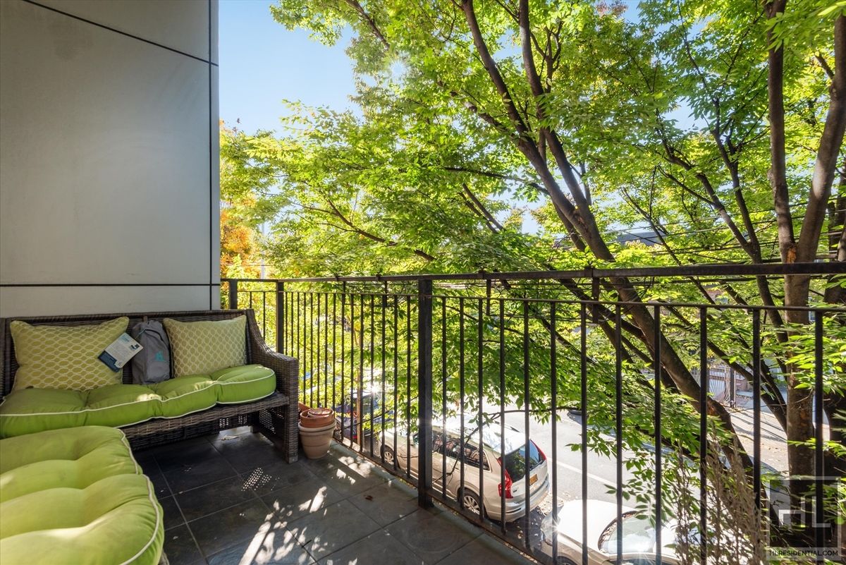 727 Dean Street, Unit 2F Brooklyn, NY 11238 - Photo 10 of 16 a building outdoor space with patio furniture