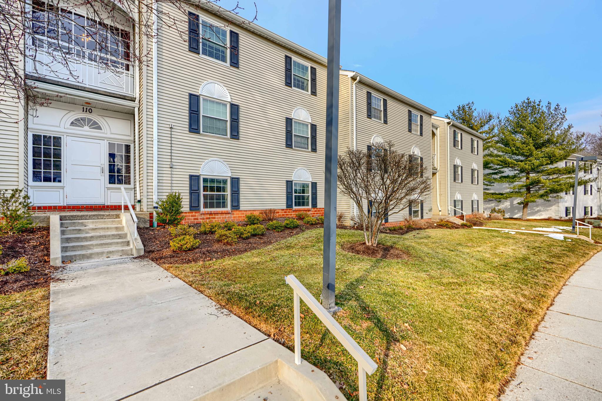 110 Castletown Road, Unit 201 Lutherville-Timonium, MD 21093 - Photo 2 of 41 a view of a house with palm trees
