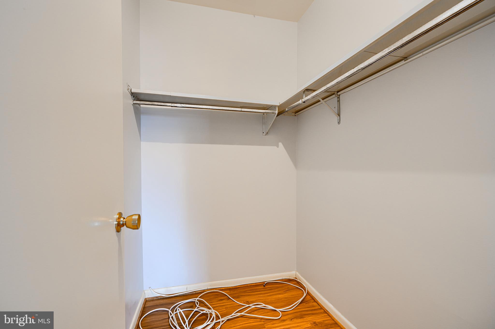 110 Castletown Road, Unit 201 Lutherville-Timonium, MD 21093 - Photo 23 of 41 a view of a room with rack on the wall