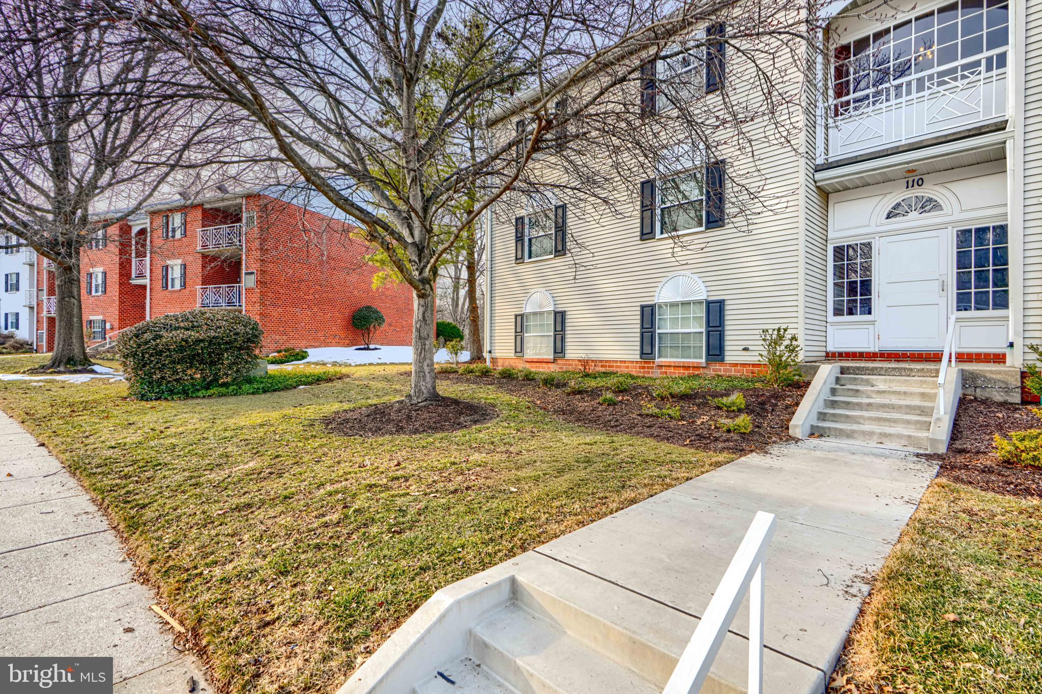 110 Castletown Road, Unit 201 Lutherville-Timonium, MD 21093 - Photo 3 of 41 a view of a yard with a house
