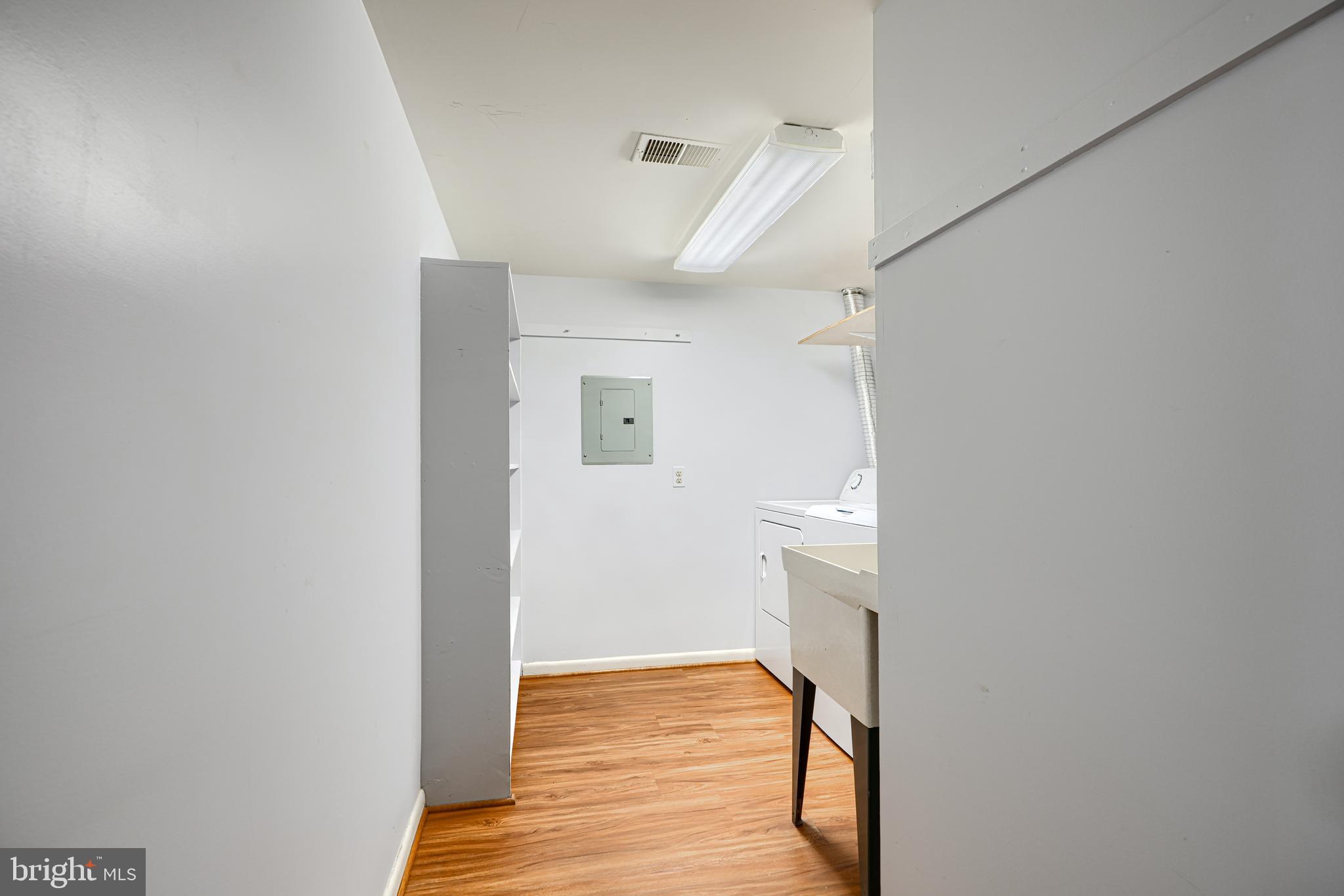 110 Castletown Road, Unit 201 Lutherville-Timonium, MD 21093 - Photo 37 of 41 a view of hallway with wooden floor