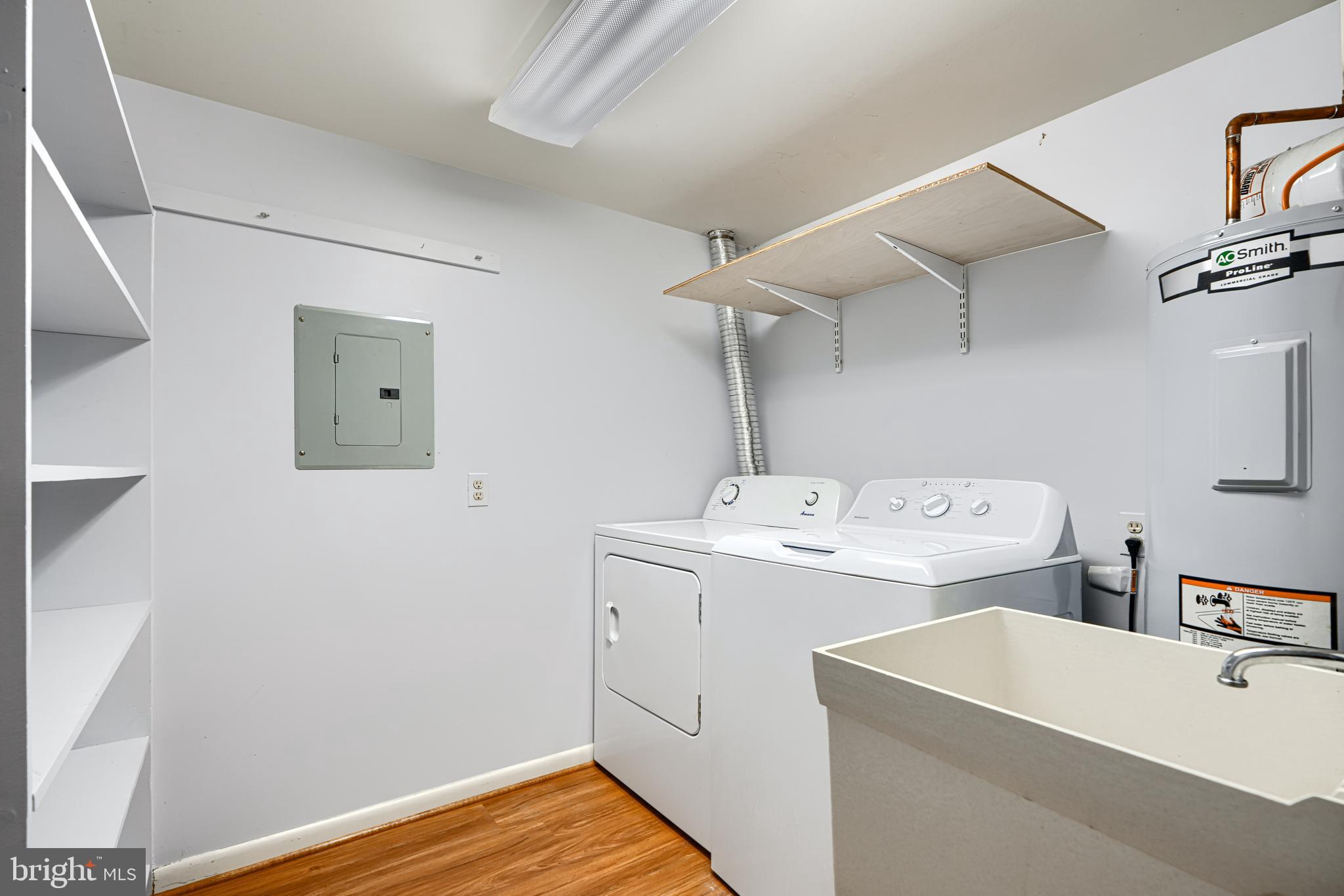 110 Castletown Road, Unit 201 Lutherville-Timonium, MD 21093 - Photo 38 of 41 a view of utility room with washer and dryer