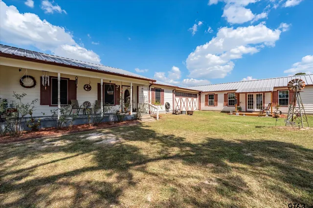 a front view of house with yard