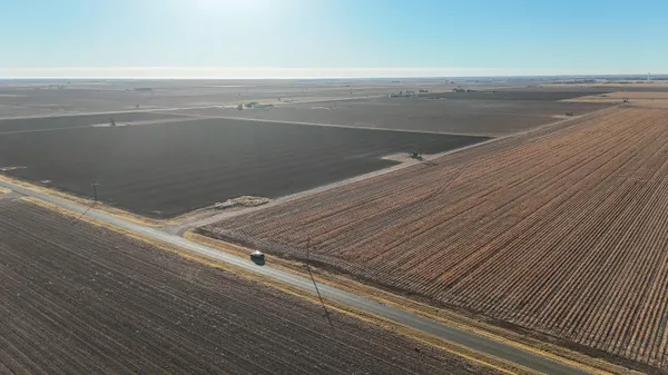 a view of room with wooden floor