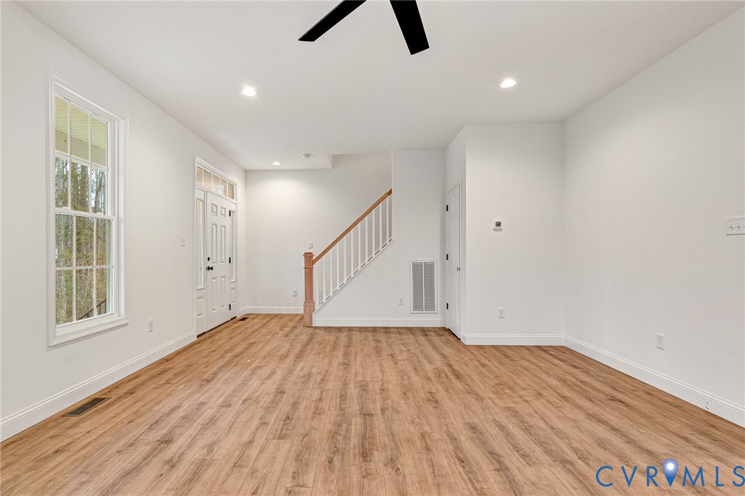 4715 Shannon Hill Road Columbia, VA 23038 - Photo 20 of 52 a view of empty room with wooden floor and window