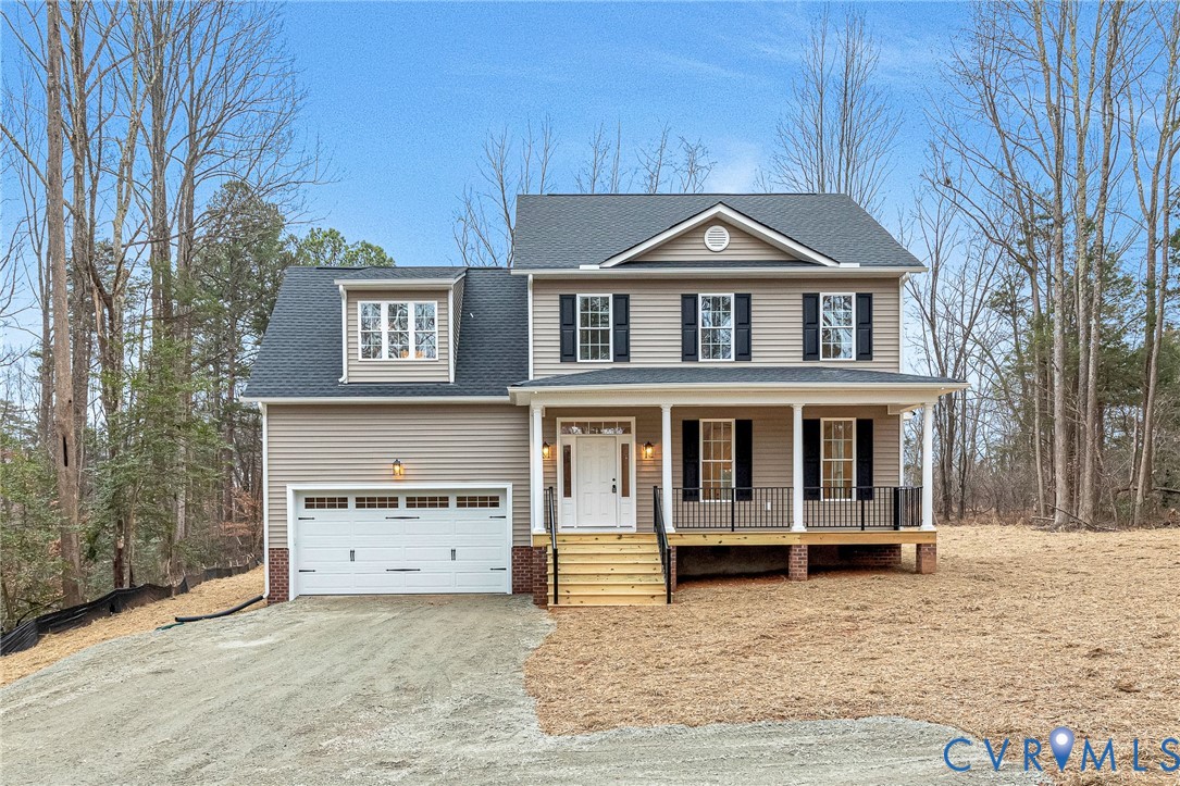 4715 Shannon Hill Road Columbia, VA 23038 - Photo 2 of 52 a front view of a house with a yard