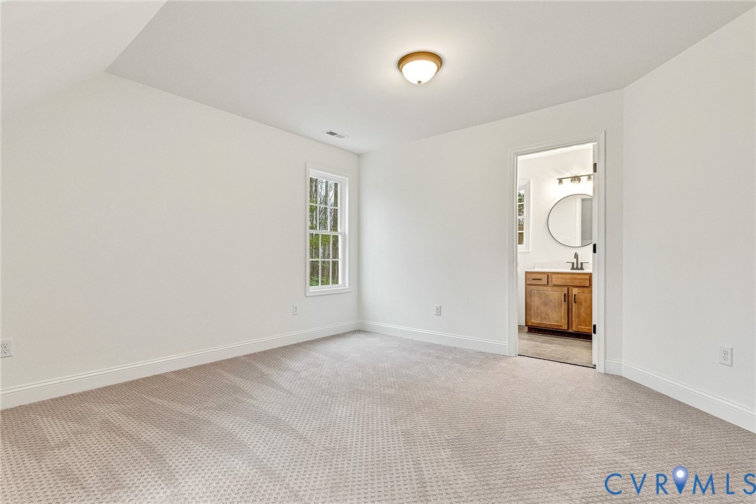 4715 Shannon Hill Road Columbia, VA 23038 - Photo 27 of 52 an empty room with windows and entrance