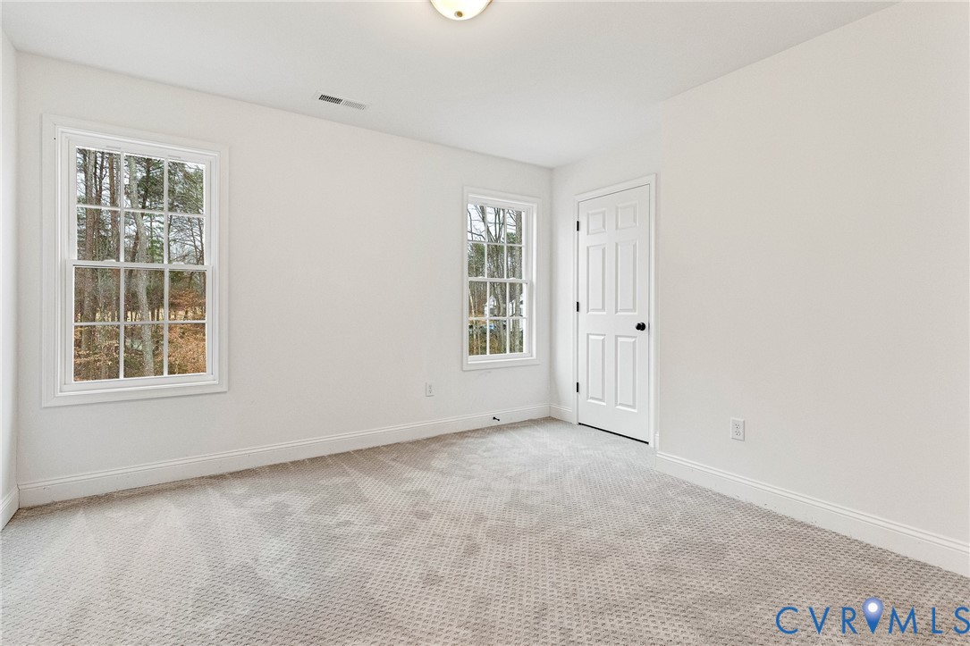 4715 Shannon Hill Road Columbia, VA 23038 - Photo 29 of 52 an empty room with windows