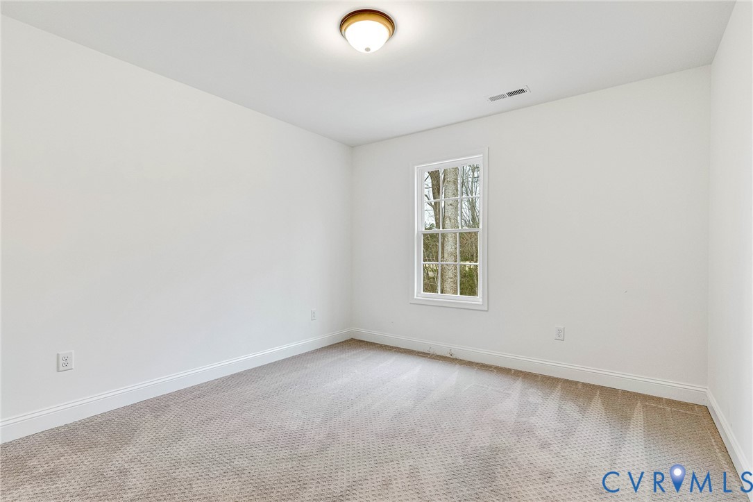 4715 Shannon Hill Road Columbia, VA 23038 - Photo 33 of 52 an empty room with a window