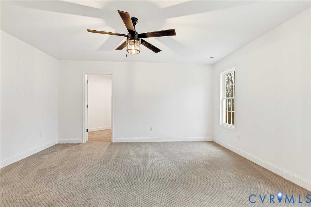 4715 Shannon Hill Road Columbia, VA 23038 - Photo 37 of 52 a view of room with ceiling fan
