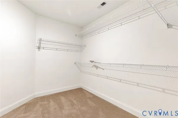 a view of a room with racks on the wall