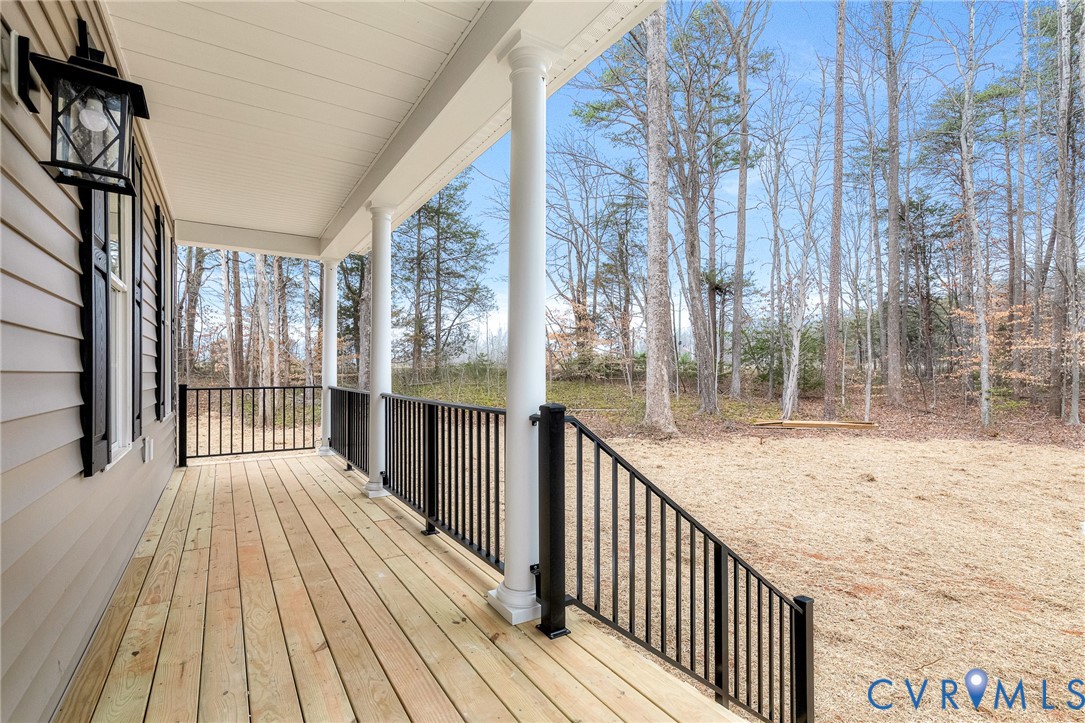 4715 Shannon Hill Road Columbia, VA 23038 - Photo 5 of 52 a view of balcony with wooden floor