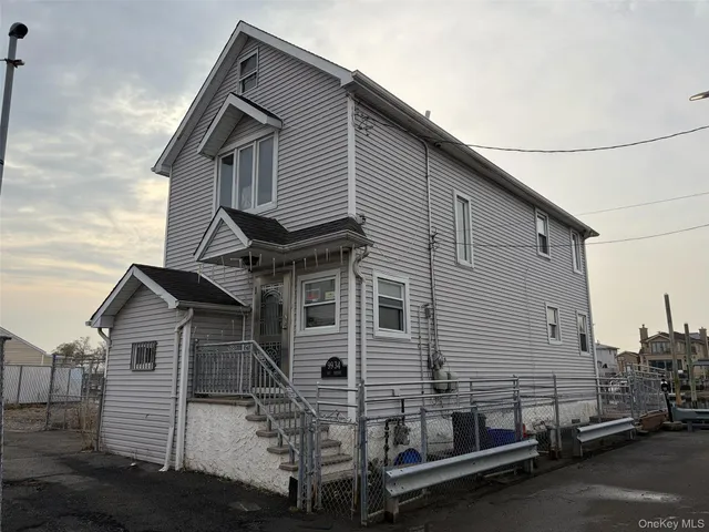 a view of a house with a garage