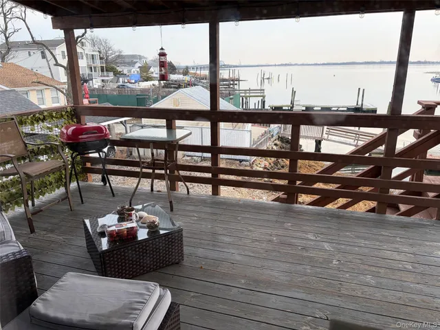 a view of a terrace with seating area