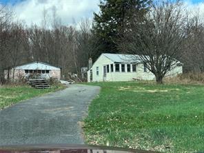 977 County Rte 17 Montgomery, NY 12549 - Photo 1 of 1 a view of a house with backyard and sitting area