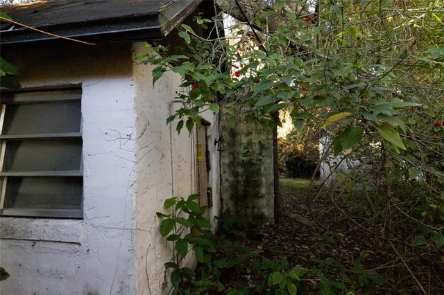 a view of a hallway with a door