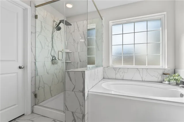 a view of a patio with table and chairs potted plants with wooden floor