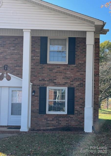 175 17th Street Northwest, Unit G6 Hickory, NC 28601 - Photo 1 of 12 a front view of a house with a yard