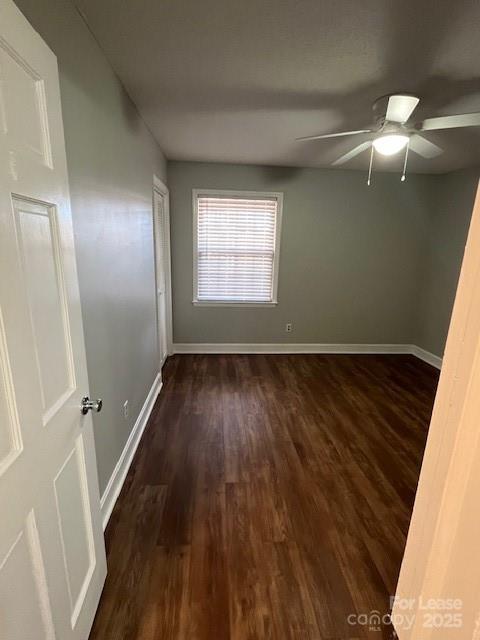 175 17th Street Northwest, Unit G6 Hickory, NC 28601 - Photo 10 of 12 an empty room with wooden floor and windows
