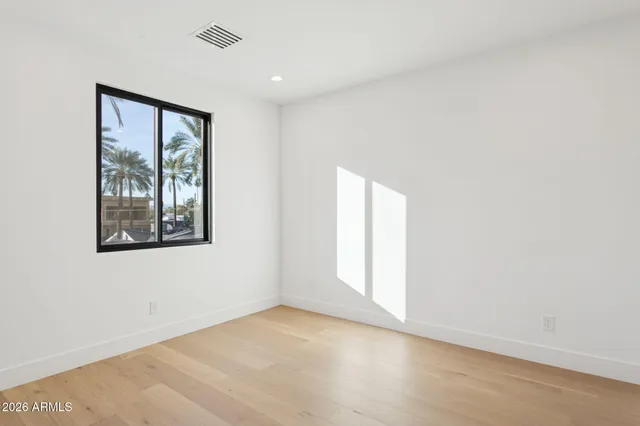 an empty room with windows