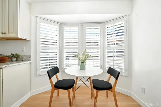 a room with furniture and a large window