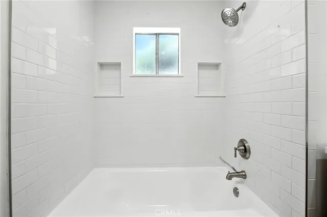 a bathroom with a bathtub
