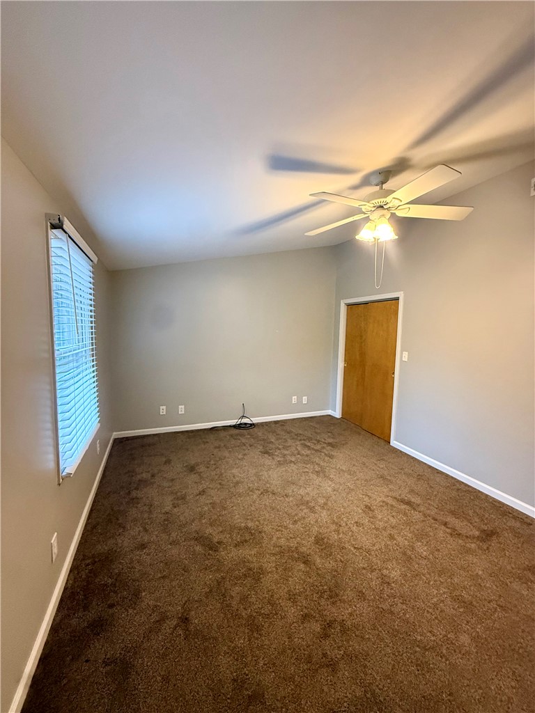 1200 Loran Pointe Circle Seneca, SC 29672 - Photo 21 of 29 This spacious bedroom offers ample natural light and a comfortable atmosphere for rest and relaxation.