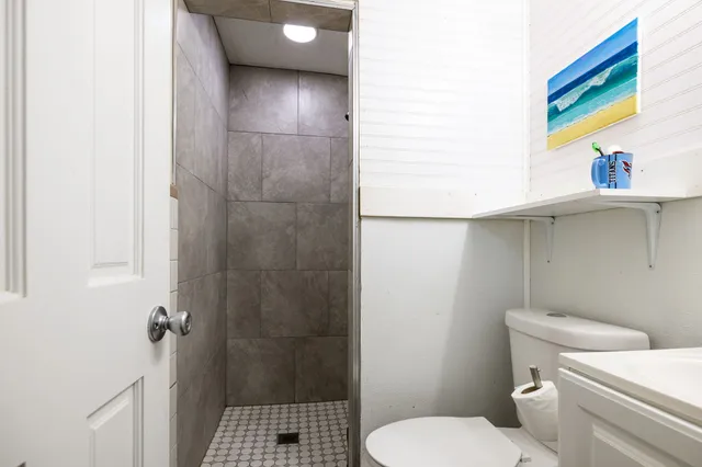 a bathroom with a sink and a window