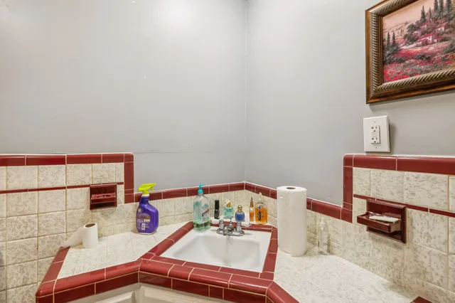 a room with workspace toys and windows