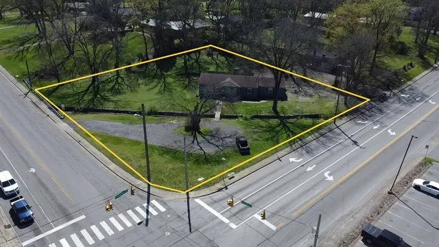an aerial view of house with a swimming pool