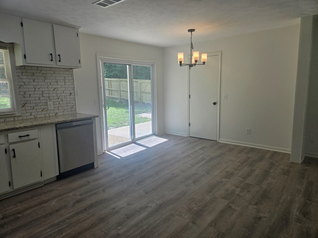 4335 Anglin Road Columbus, GA 31907 - Photo 12 of 26 Dining Space , This view shows Dining Space, with Sliding Glass door to back yard and the door to your laundry room.