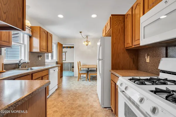 a view of hallway with livingroom and bedroom
