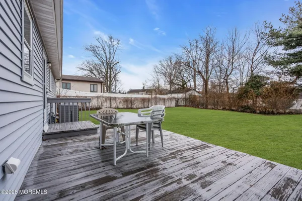 a view of a house with a big yard