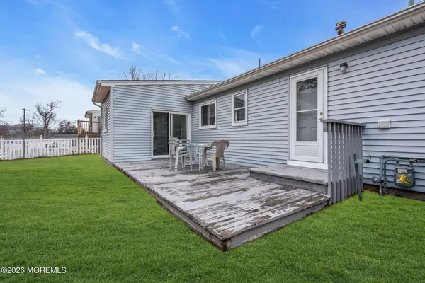 a view of a house with a big yard