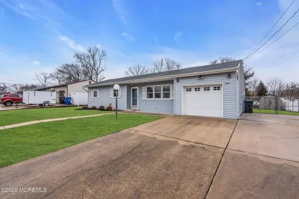 a view of outdoor space yard and garage