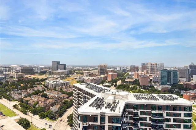 a view of city with tall buildings